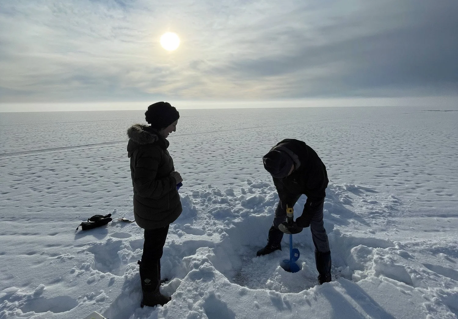  Drilling a hole to sample the water 