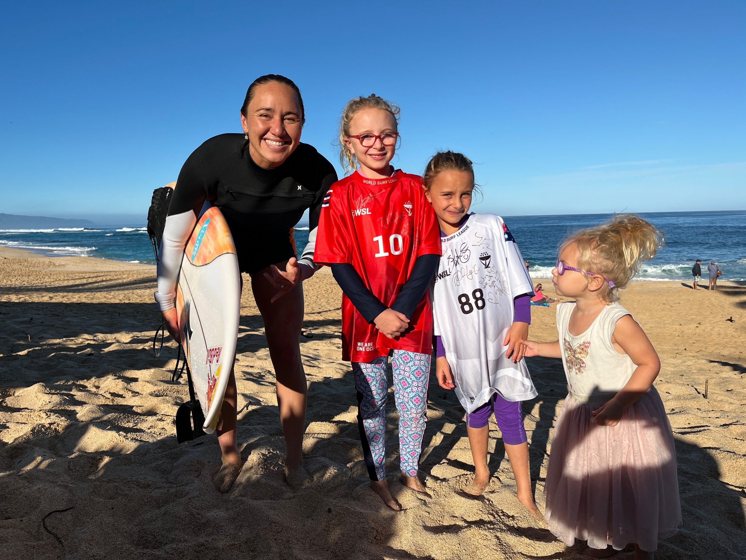 Carissa Moore at Sunset beach with Scarlett, Nora and Hazel