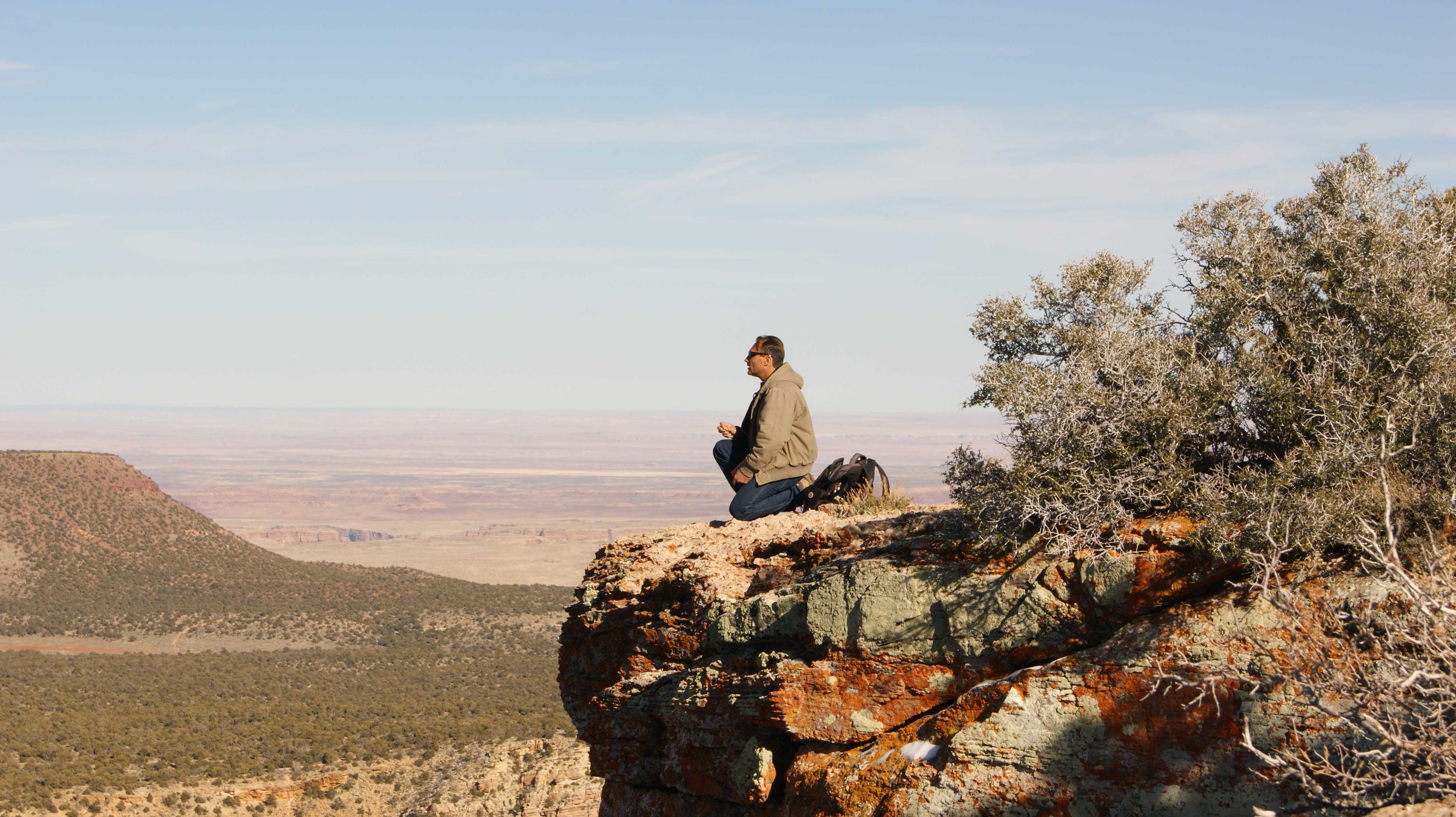 z Clint praying at desert view.JPG