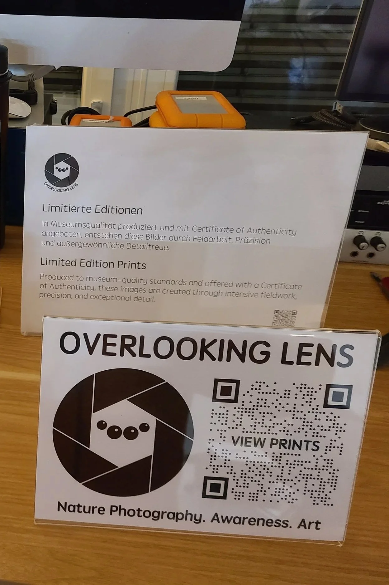 overlooking-lens-tabletop-info-sign-mockups-qr-codes-exhibition.jpg