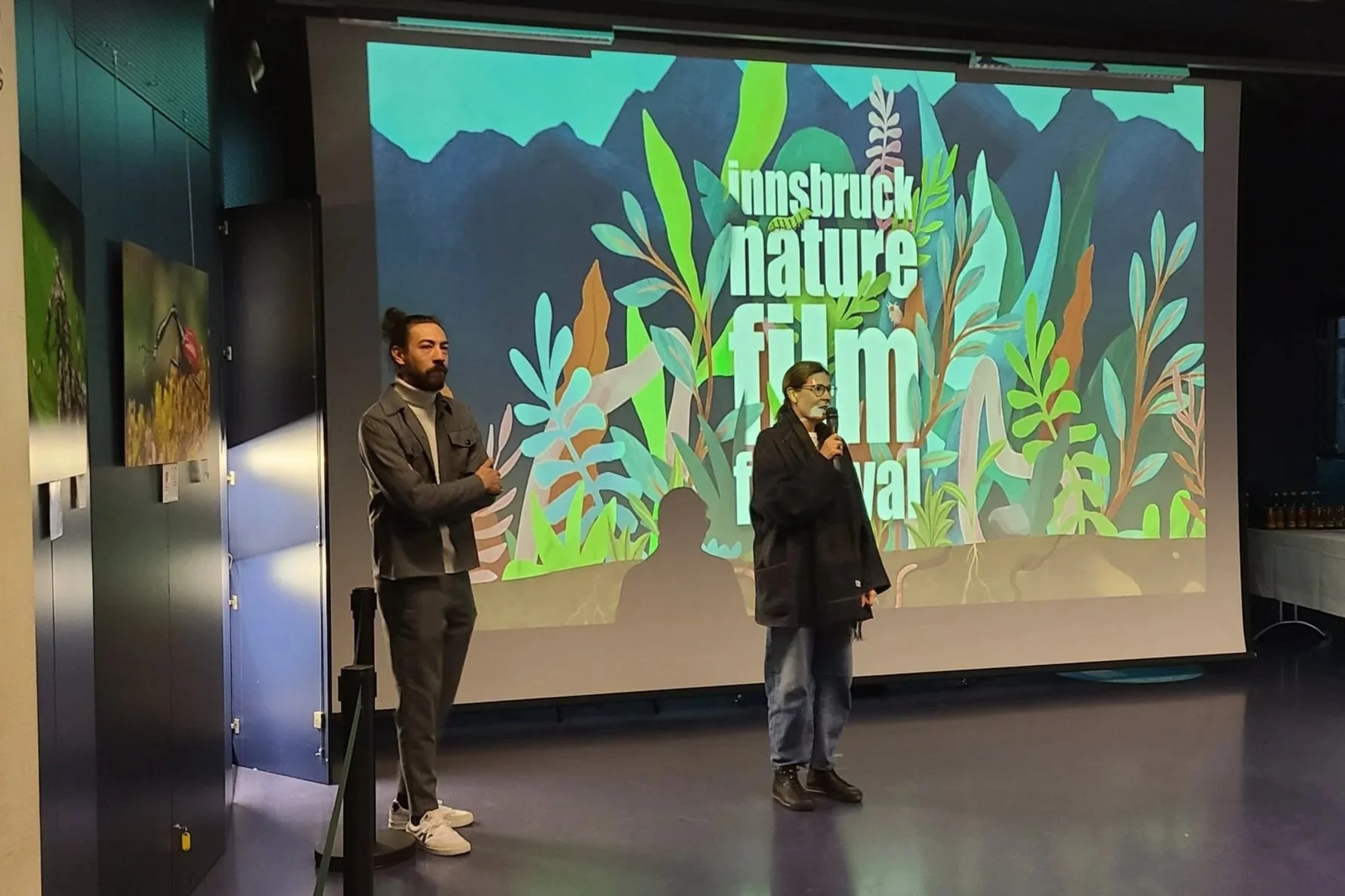 inff-vernissage-elizabeth-stark-speech-wide-inff-logo-projection.jpg