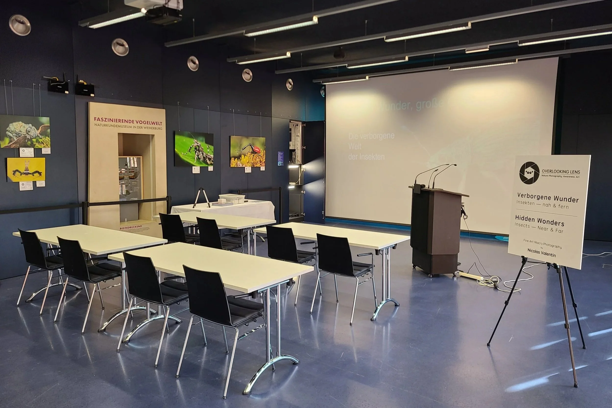 overlooking-lens-workshop-a-setup-wide-desks-podium-projector-screen-fine-art-prints.jpg