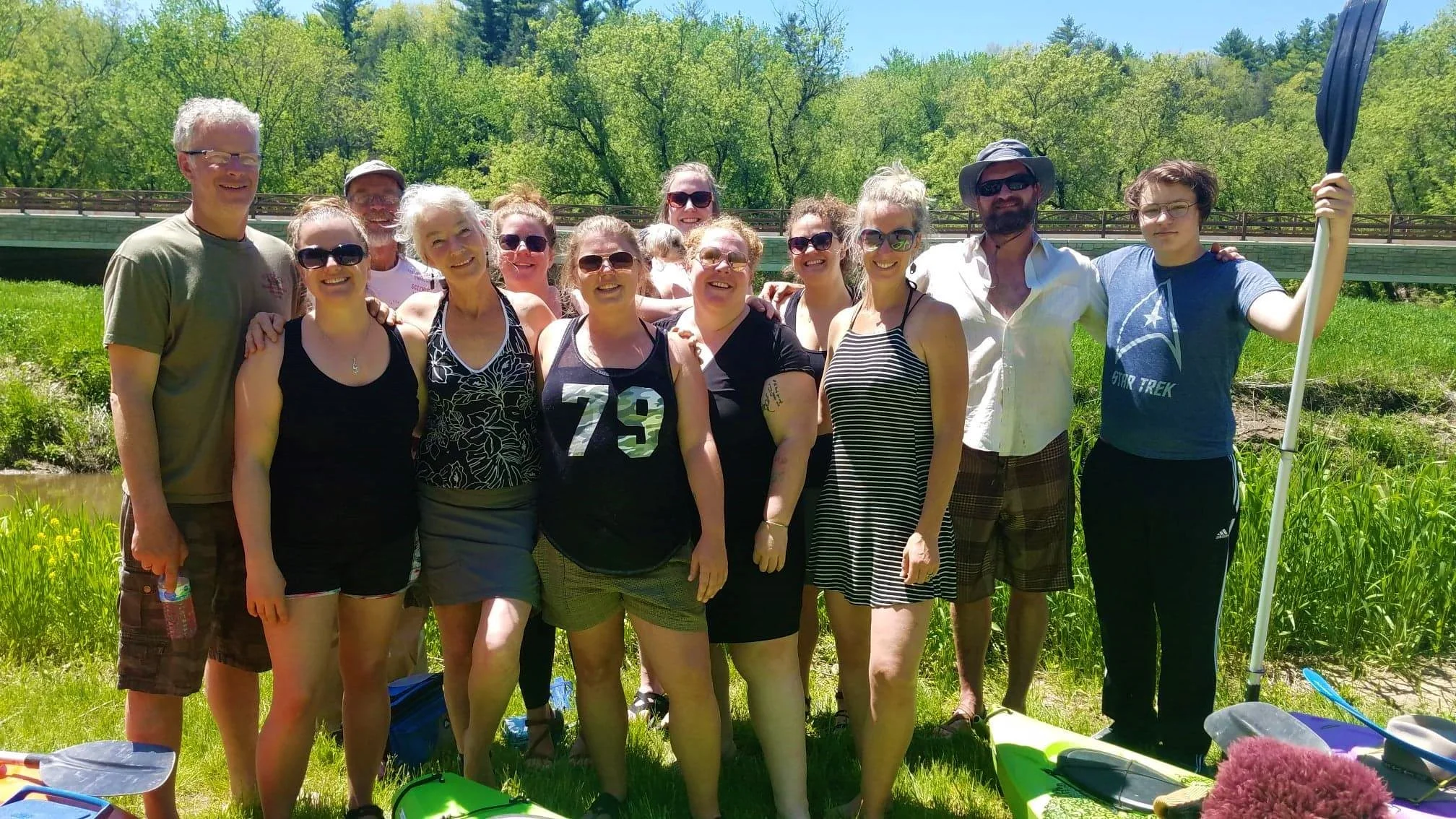 Pictured back row L to R- L to R - Kya Workowski, Ken Workoski, Jamie Lamonde, Barb Richter holding Oscar the Kayaking Wonder Dog, Allison Mendoza, Dan Hublein and Thane Parr. Front row L to R- Morgan Cherven, Michelle Workowski, Cheree van Staden, Mona B, and Marissa Worskowski