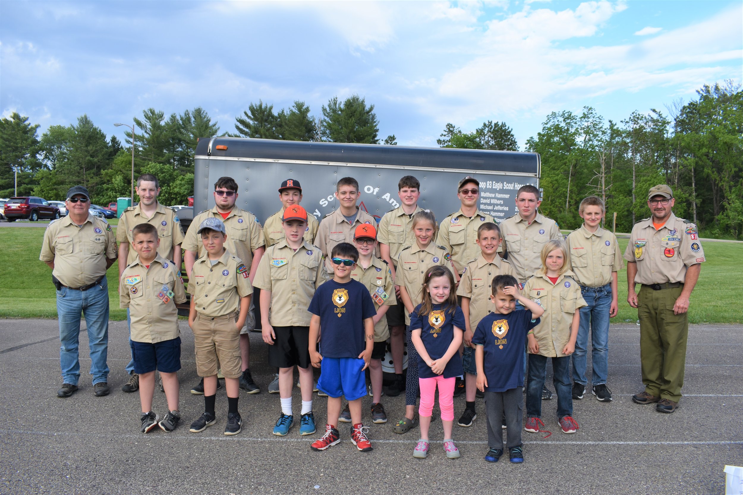  Scouts in service representing Troop 83, Cub scouts Pack 83, and Elroy Troop 88 Front row L to R- Westin, Abby, and Brock. Second row L to R- Bryce, Nick, Marty, Marshall, Lauren, Eddie, and Oliver. Back row L to R- Scout Leaders Don Hammer and Ryan