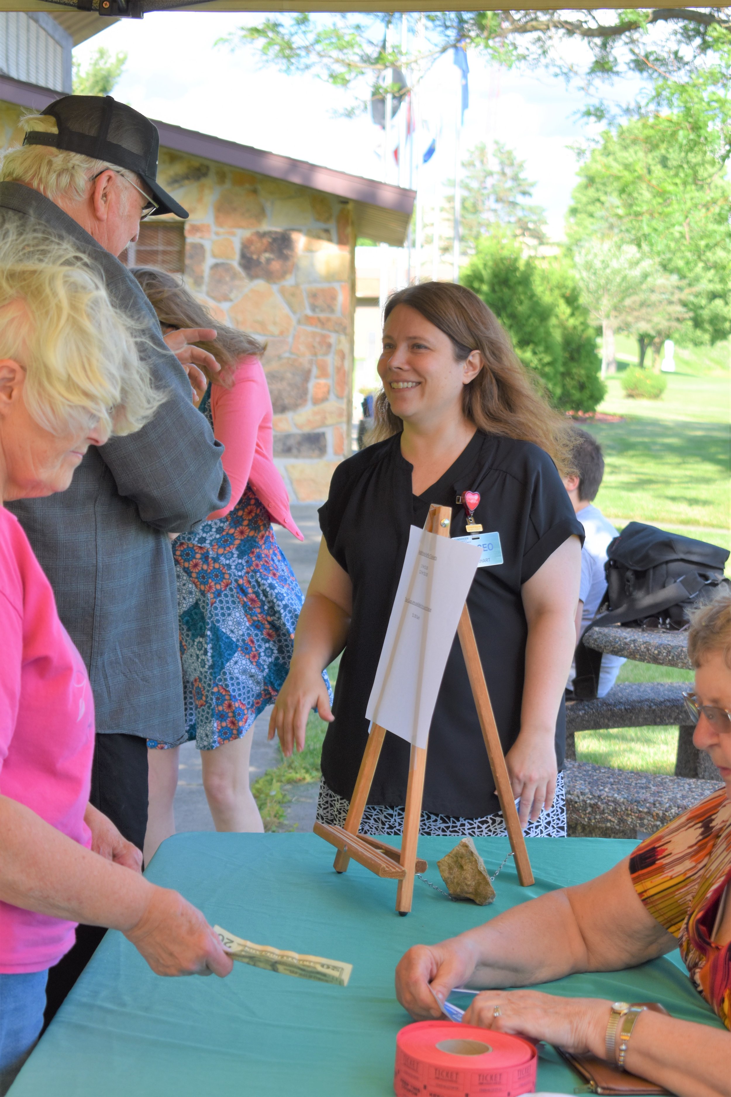 CEO of Gundersen St. Joseph's Hospital and Clinics Danielle Gearhart, greets tea party guests