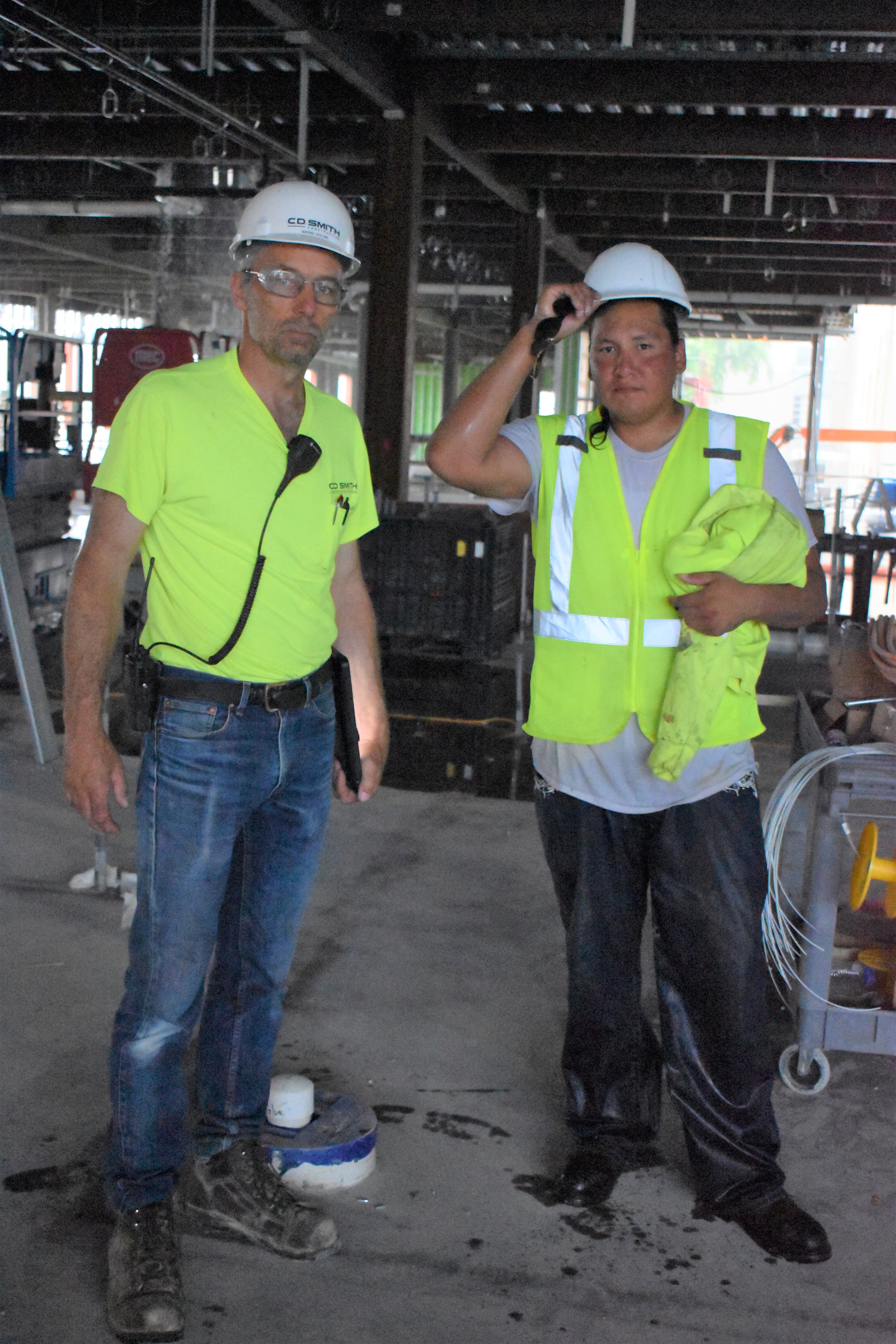 Site Superintendent Holum with roofer Mr. Cooper