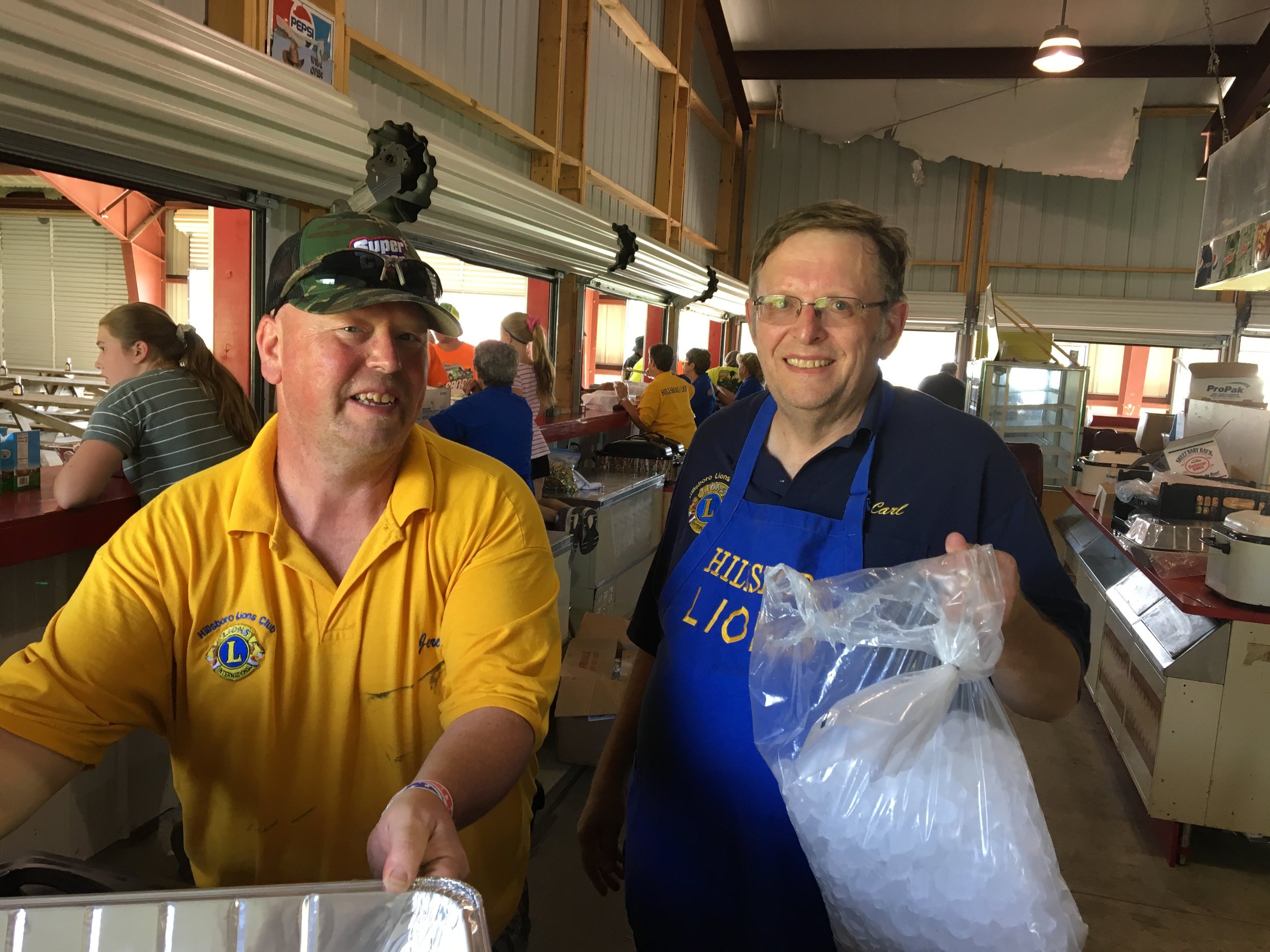 Lions Jeremiah Boehme (left) and Carl Baller ice the beverages