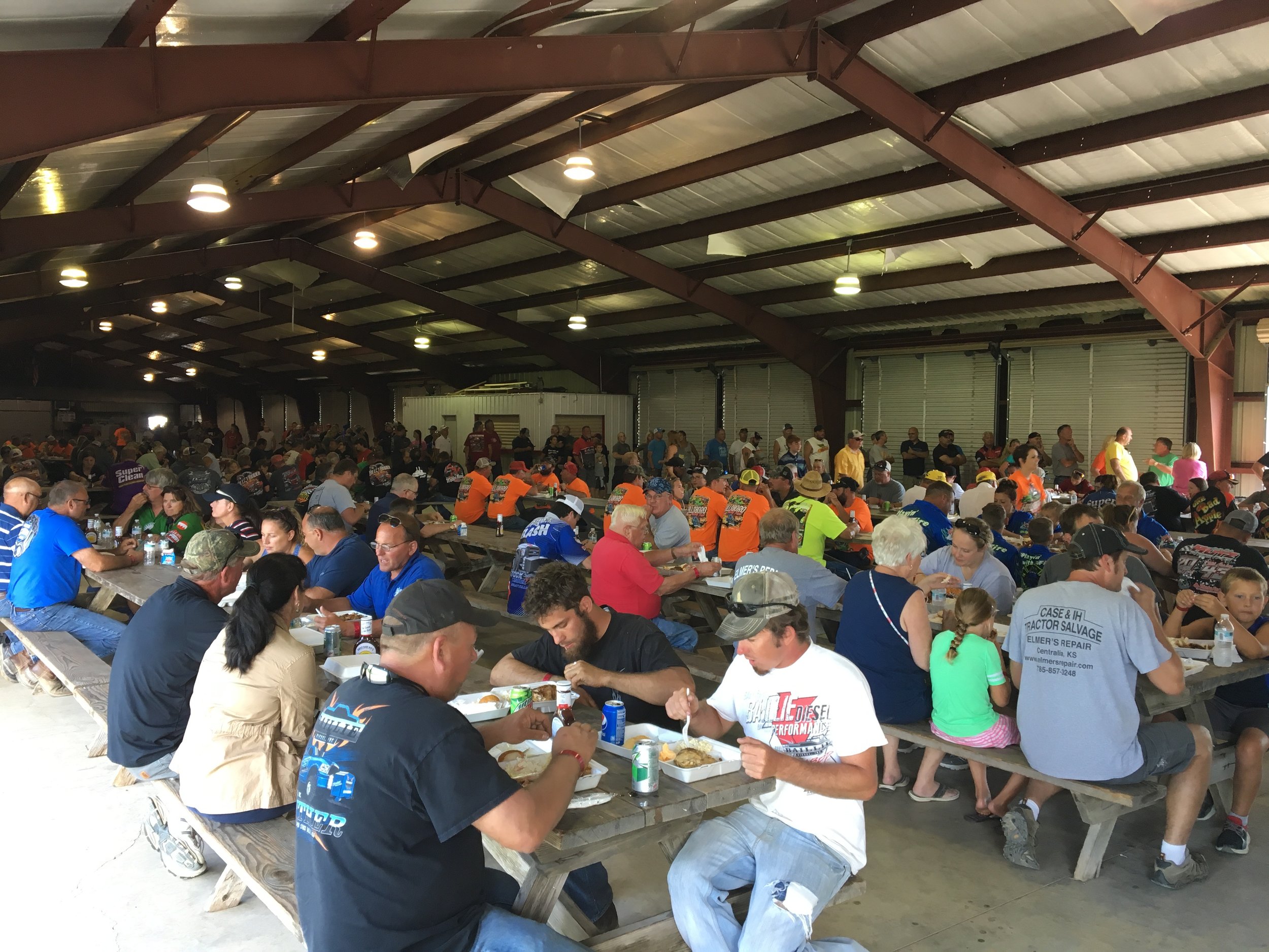 Tractor pullers, their pit crews, and families fill the Hillsboro Fireman’s Memorial Park.