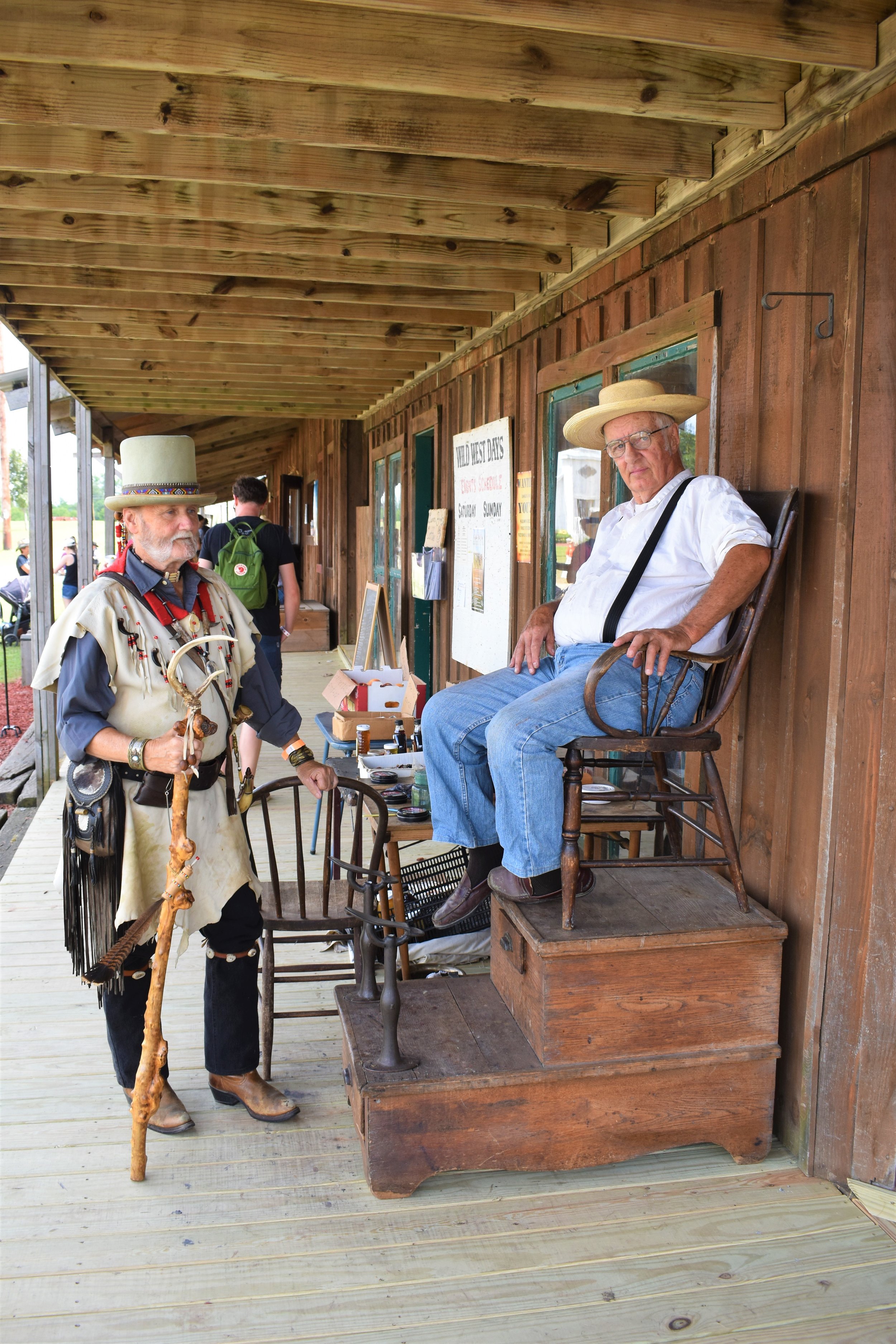 Rendezvouser Silver Tip (left), chews the fat with the local shine man