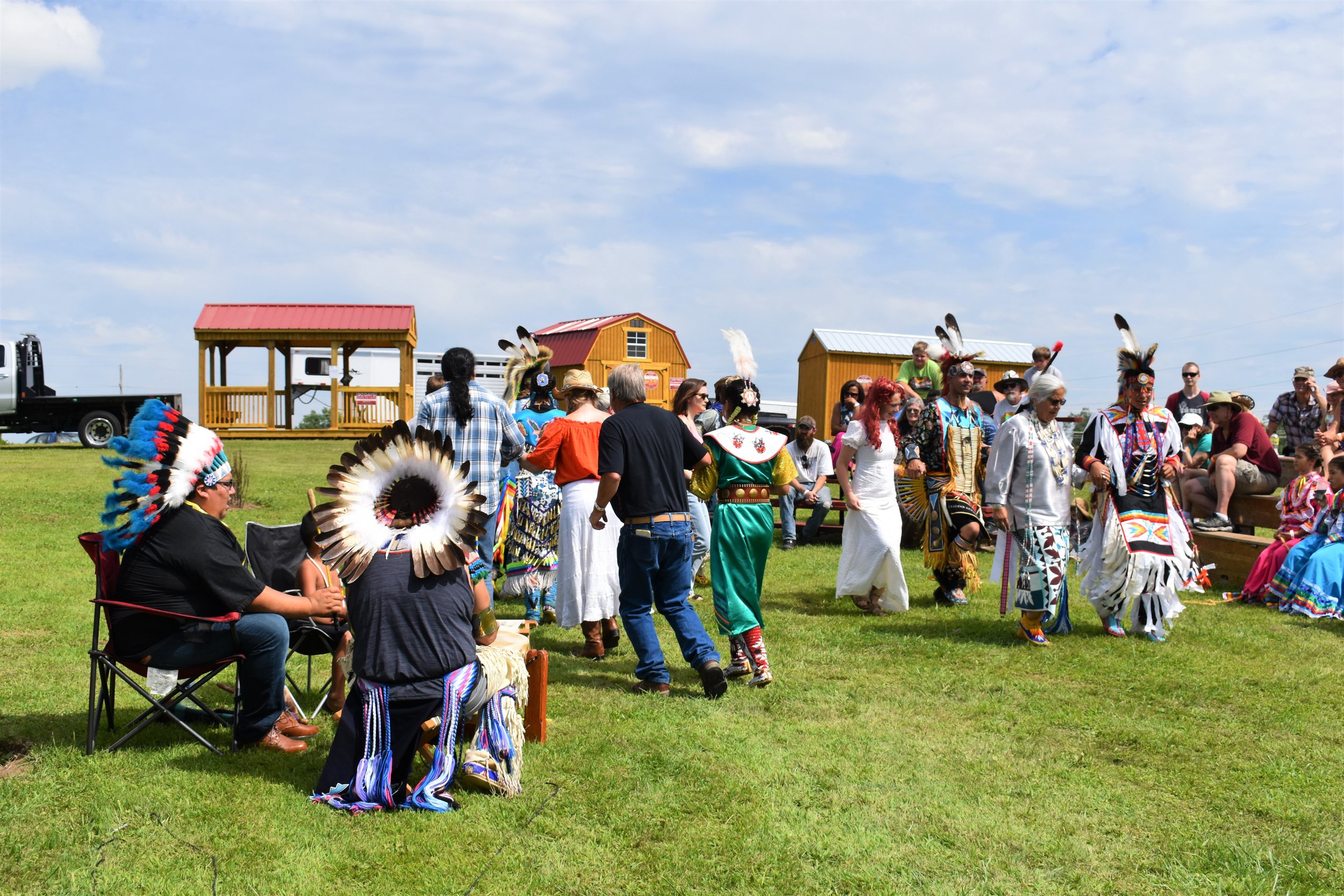 Some of the spectators join in a two-step