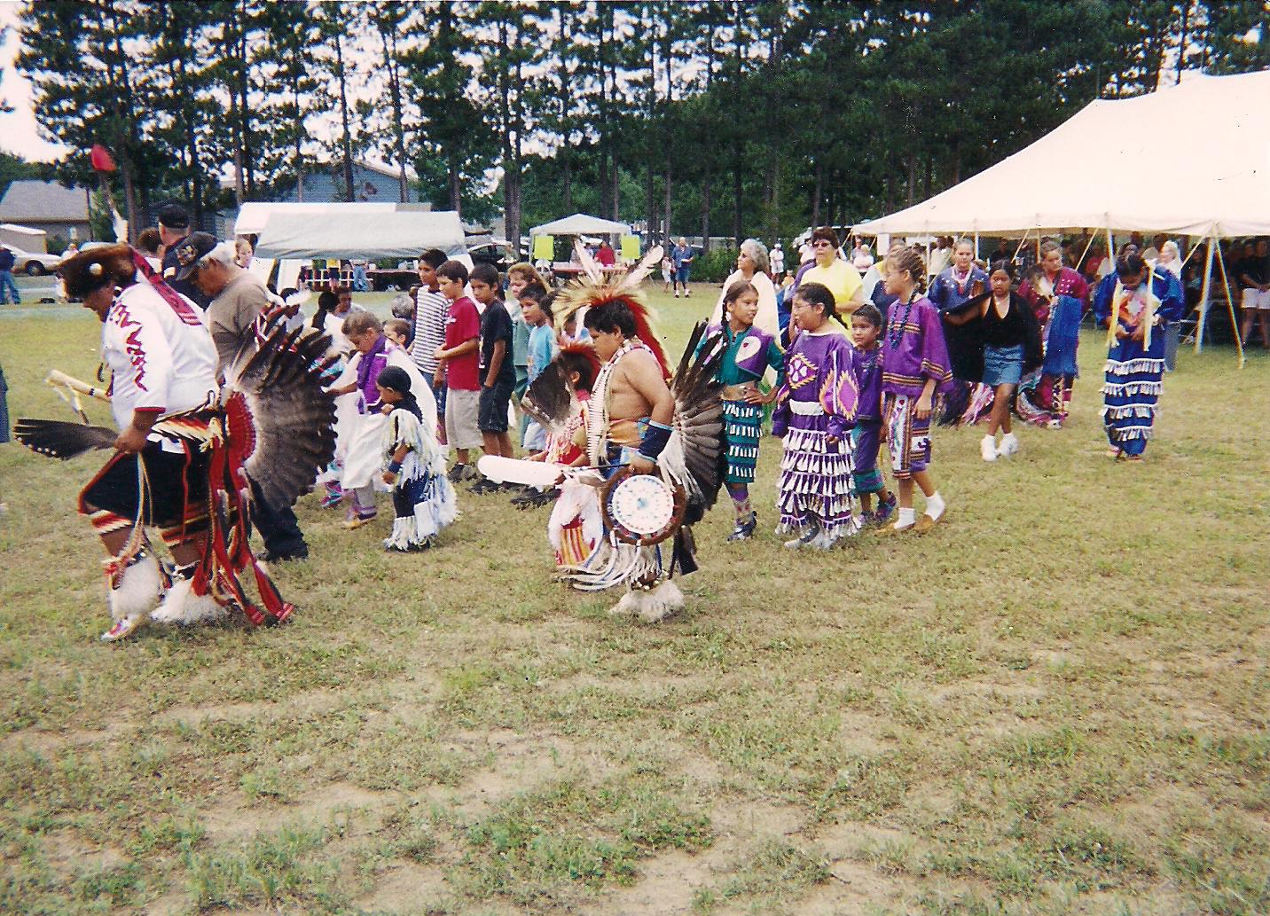 Nekoosa powwow, me dancing with the young ones.