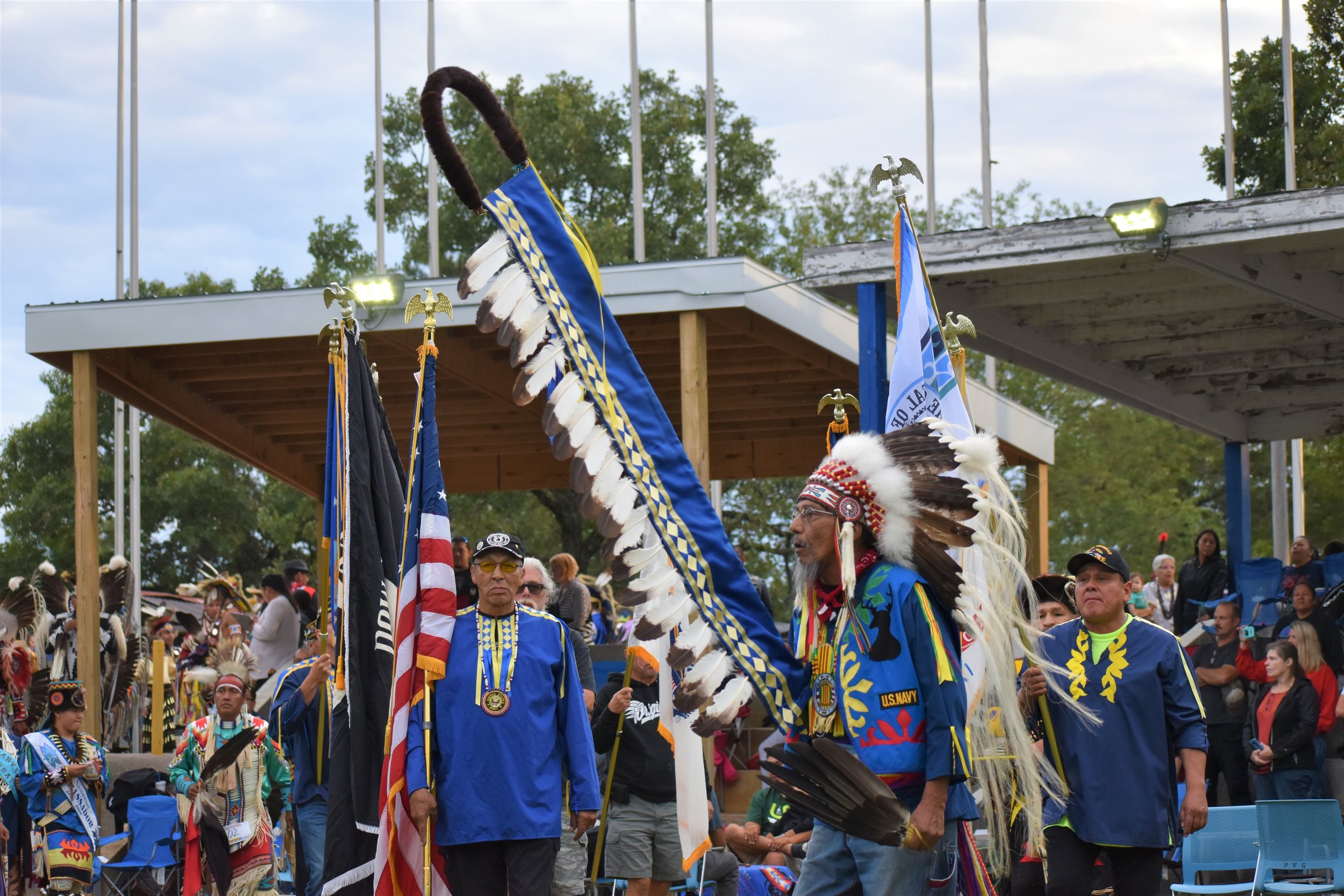 Vietnam Veteran, Mr. Levi Blackdeer carrying in the Ho-Chunk Eagle staff