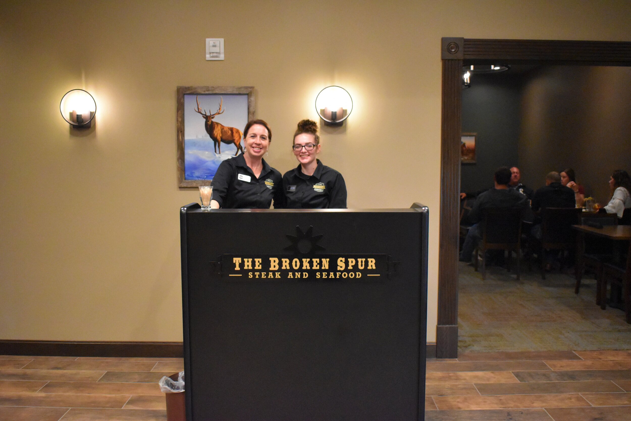 L to R- Front desk attendant and Two Elks event center co-coordinator Karen Boyle, and Broken Spur server Faith Ploof.