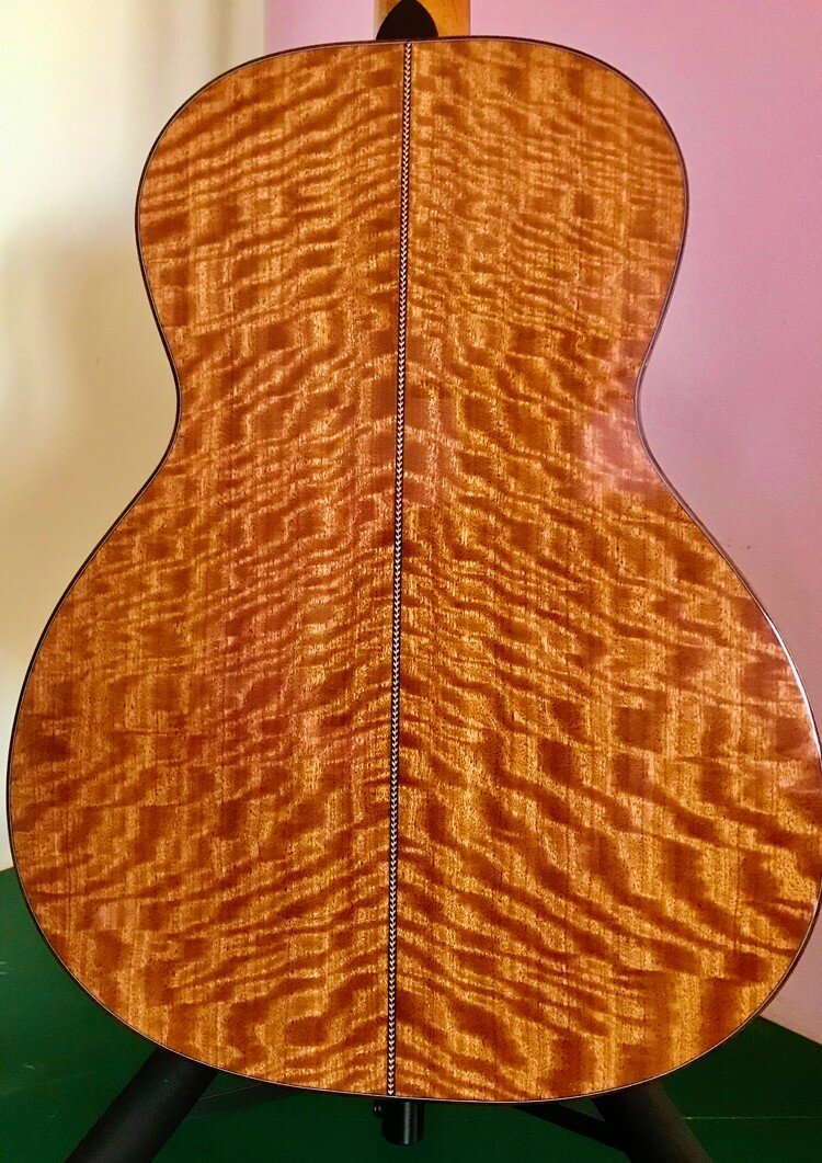    Body woods for Rocky Road guitars are selected for their sonic qualities and appearance. Bees Wing Mahogany was used for the back and sides of the instrument above.     