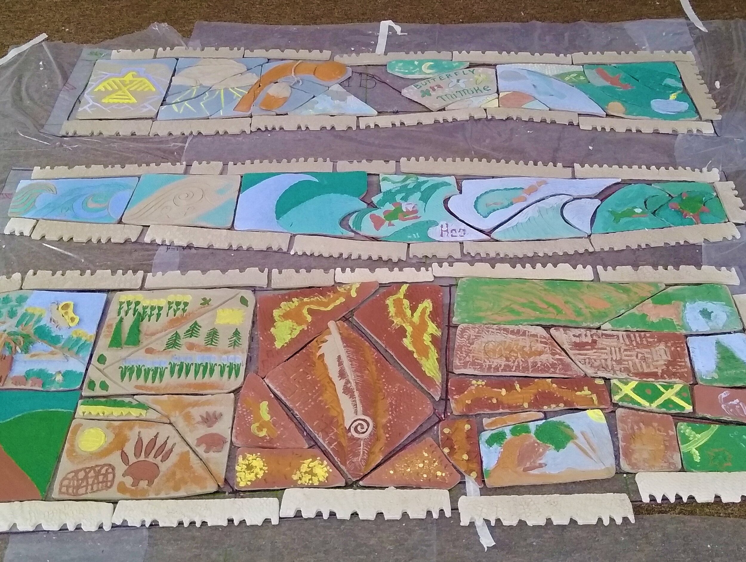  Some of the tiles for the mural strung together. 