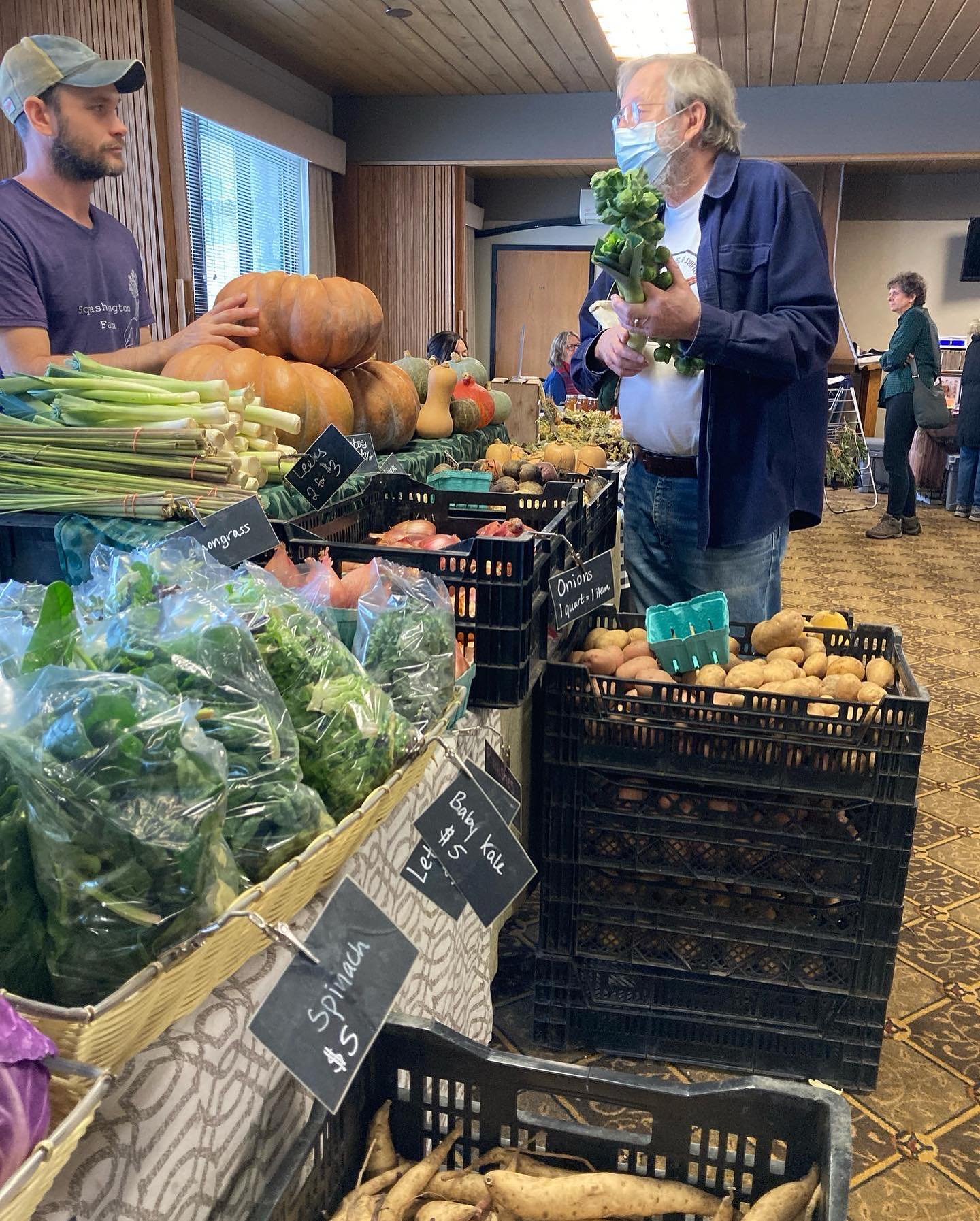  Pat selling at a farmers market. 