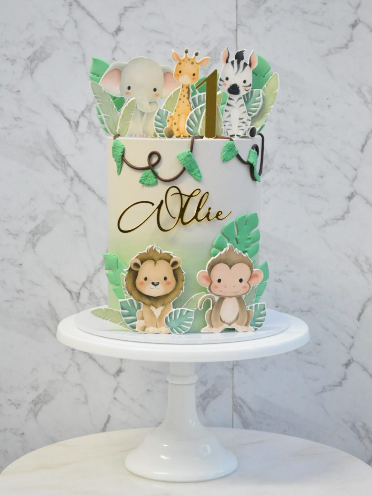 💚 O L L I E 💚
A cute jungle themed cake for Ollie&rsquo;s 1st Birthday 🦁🐯

Toppers by @ukitlaserdesign 
.
.
.
.
#cake #cakes #cakestagram #cakesofig #cakesofinsta #instacake #melbourne #melbournecakes #cakesofmelbourne #firstbirthdaycake #junglec