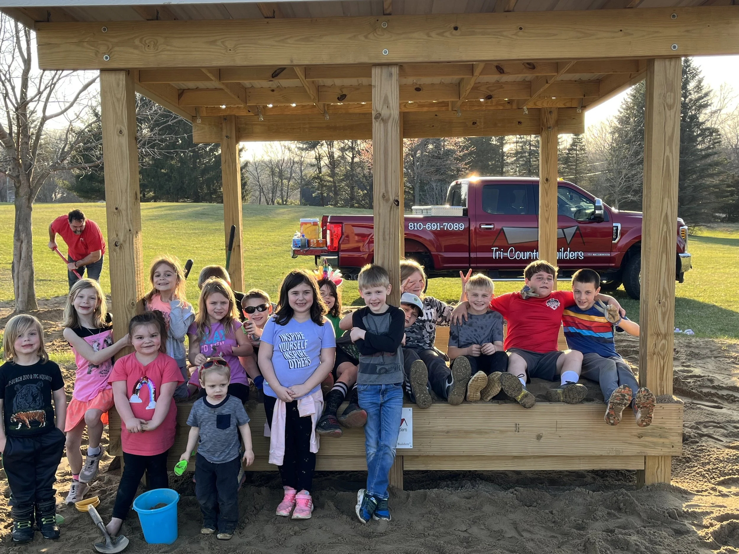 Happy kids Sand Box project Country Elementary Pinckney.jpeg