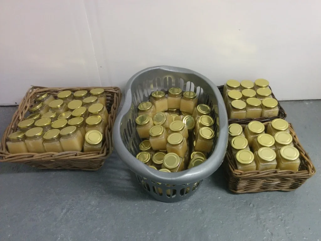 
Over 180 jars of honey ready for labels  