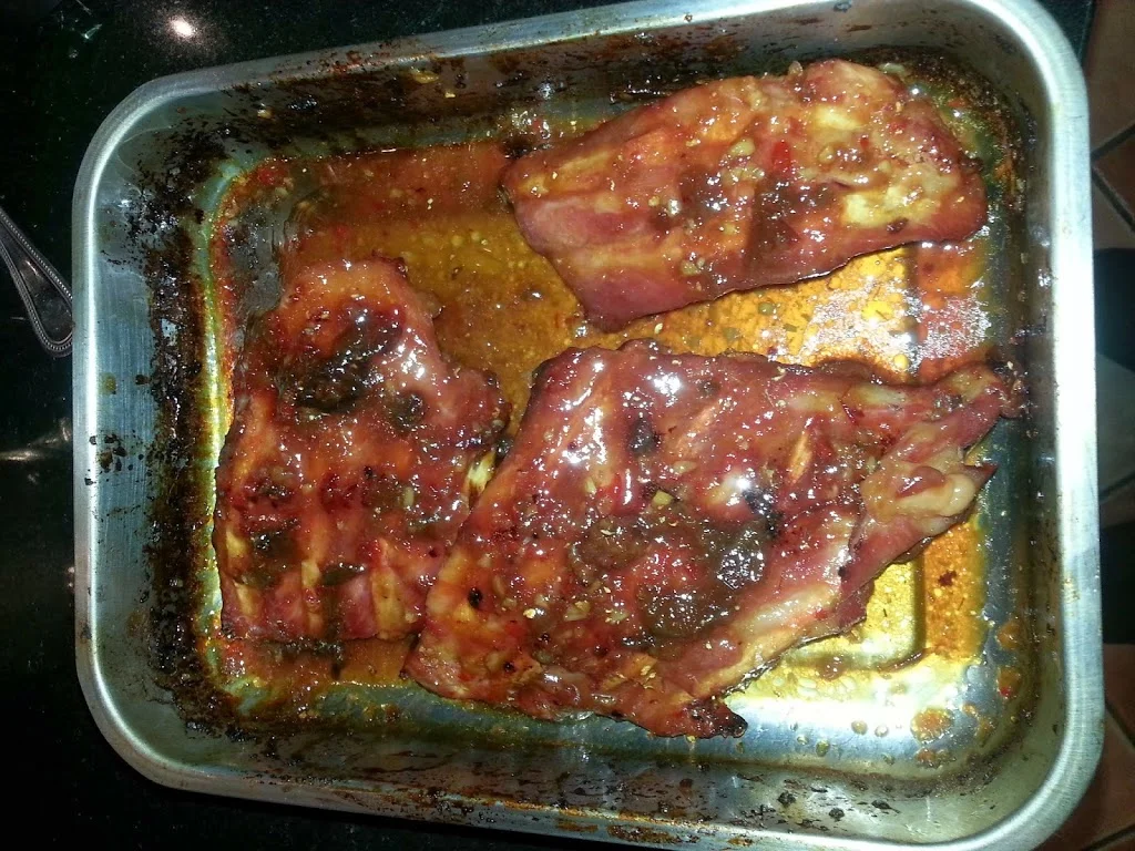 
Pork ribs going in the oven...  
