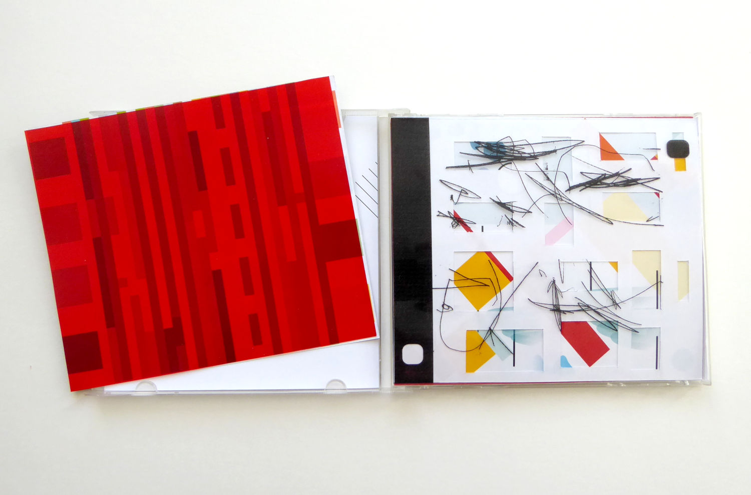 book open, with overlaid sheets