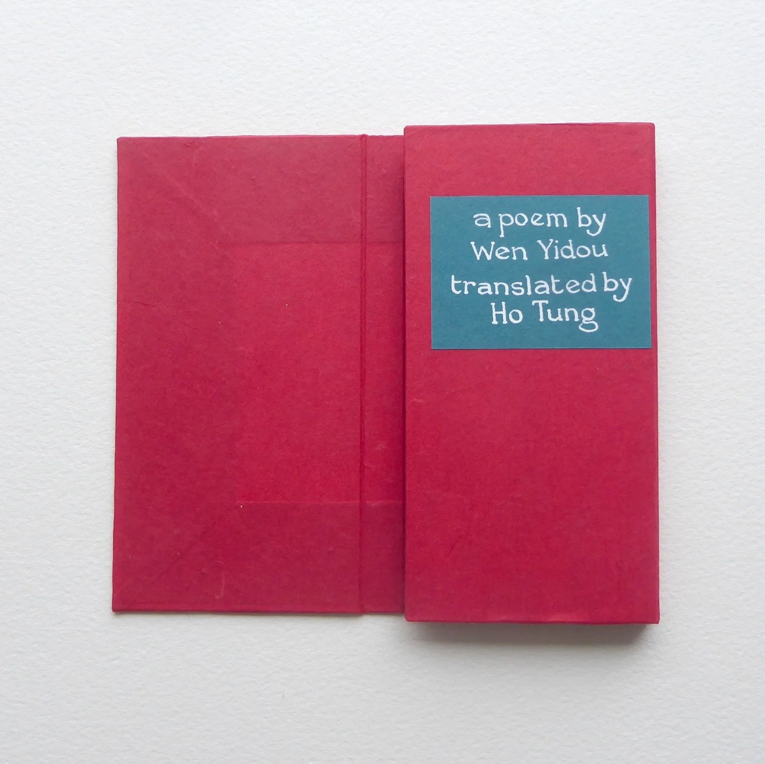  book closed, with cover flap opened 