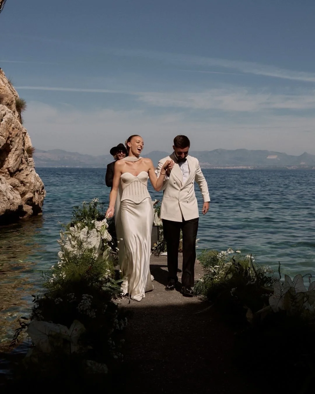 Destination bridal inspiration - save for later. ✨
⠀⠀⠀⠀⠀⠀⠀⠀⠀
Sicily, soft tailoring, and a Danielle Frankel corset worn beautifully. Megan &amp; Olly&rsquo;s celebration at Tonnara di Scopello is a reminder that bridal style can be considered, person