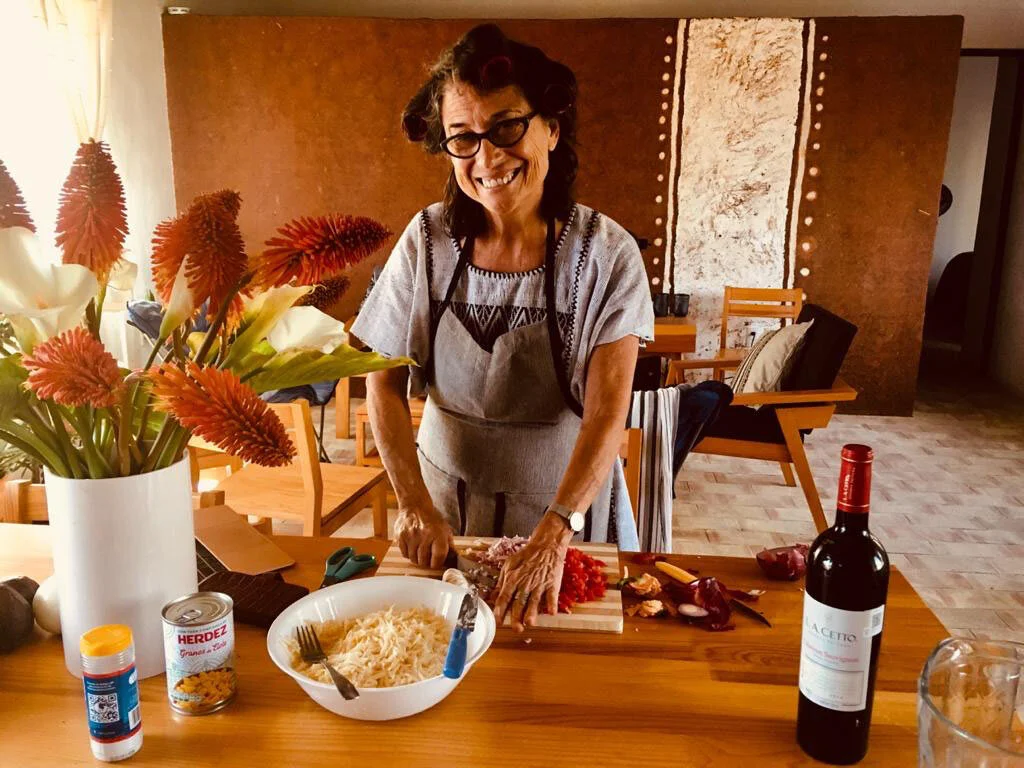 It’s a cheerful, sunny apartment and is great for entertaining.  The back wall of the livingroom has an interesting hand-stuccoed design by the architect.