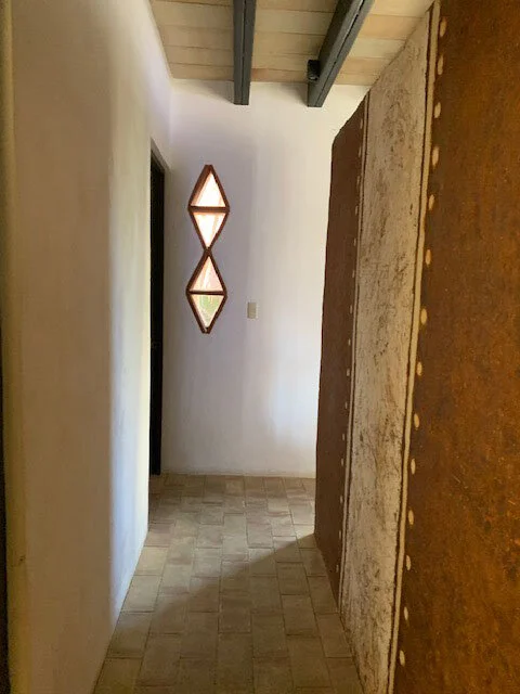 The two bedrooms are off this hallway. The architect has paid attention to even the smallest details.