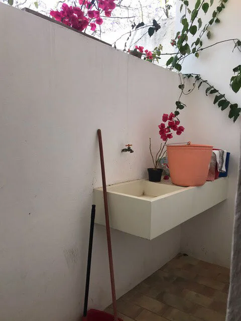 The utility room is off the kitchen.