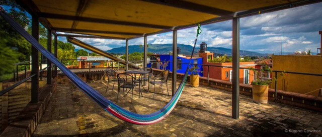 The views of Oaxaca are wonderful from the rooftop — the city to the west and the mountains to the east.