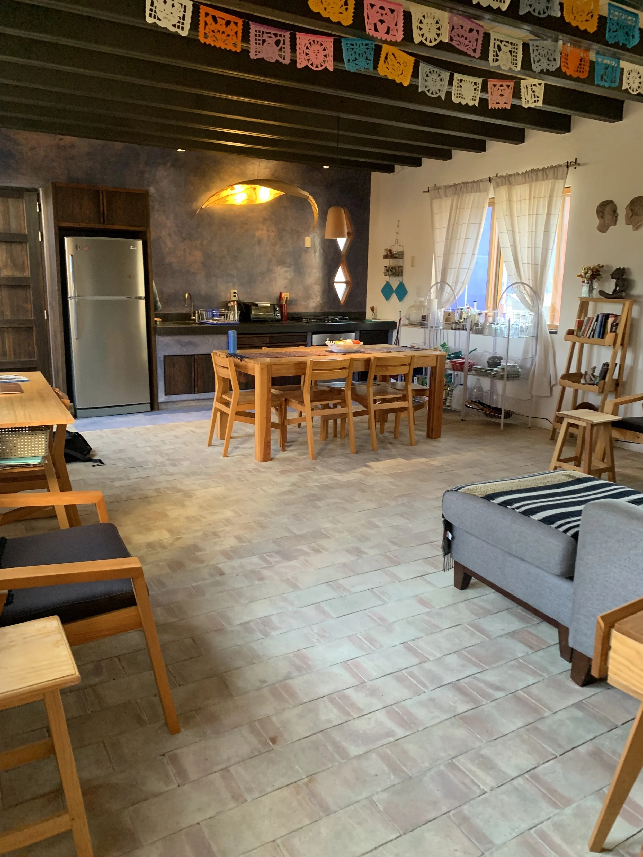 The livingroom and diningroom/kitchen are one big airy room.