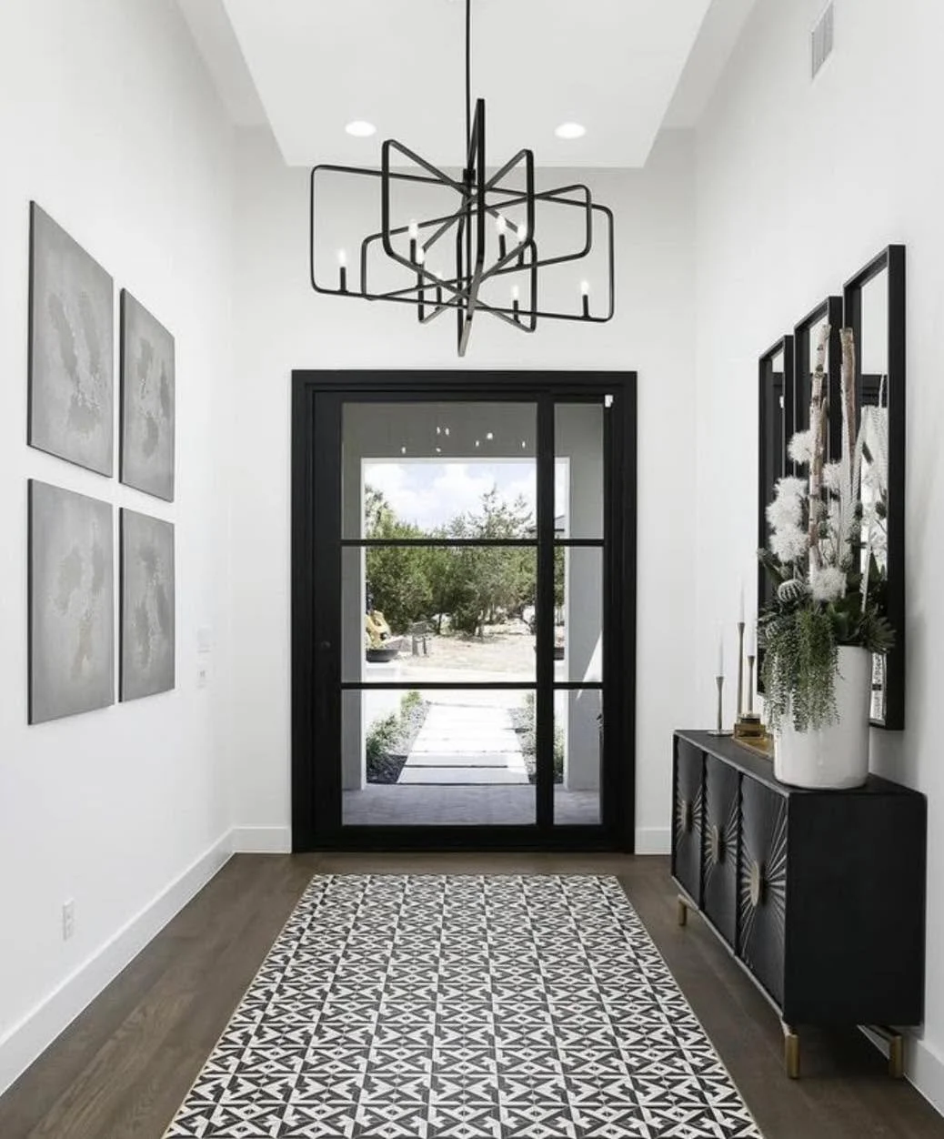 This pivot door sets the tone before you even step inside ✨🚪 Would you choose this entryway for your home?

#LuxuryEntrance #PivotDoorDesign #ModernHomes #CustomDoors #CustomBuild