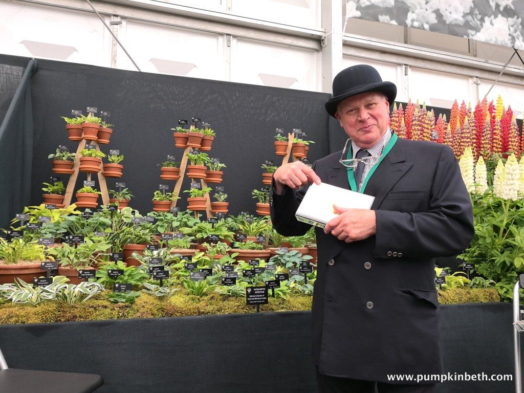 Photo by Beth Otway at Pumpkin Beth Jonathan receiving his silver-gilt medal at the 2018 RHS Chelsea Flower Show for his display of small and miniature hostas! More information at: https://www.pumpkinbeth.com/2018/05/hogarth-hostas-rhs-chelsea-flower-show-2018/