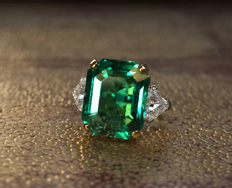 A richly colored emerald-cut green gemstone ring from the JAM Jewels archive