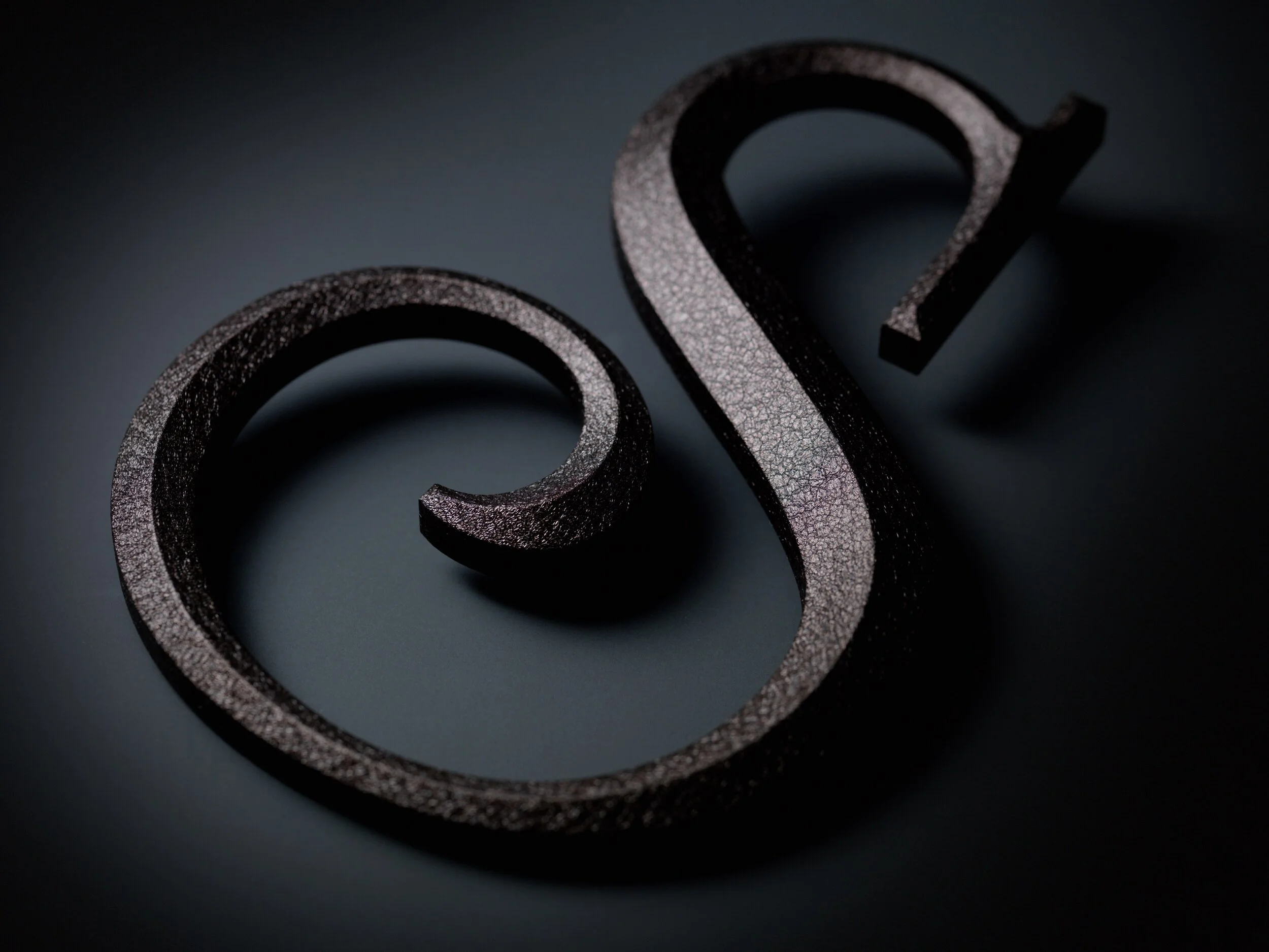 Brown Textured Prismatic Steel Art Letters.jpeg