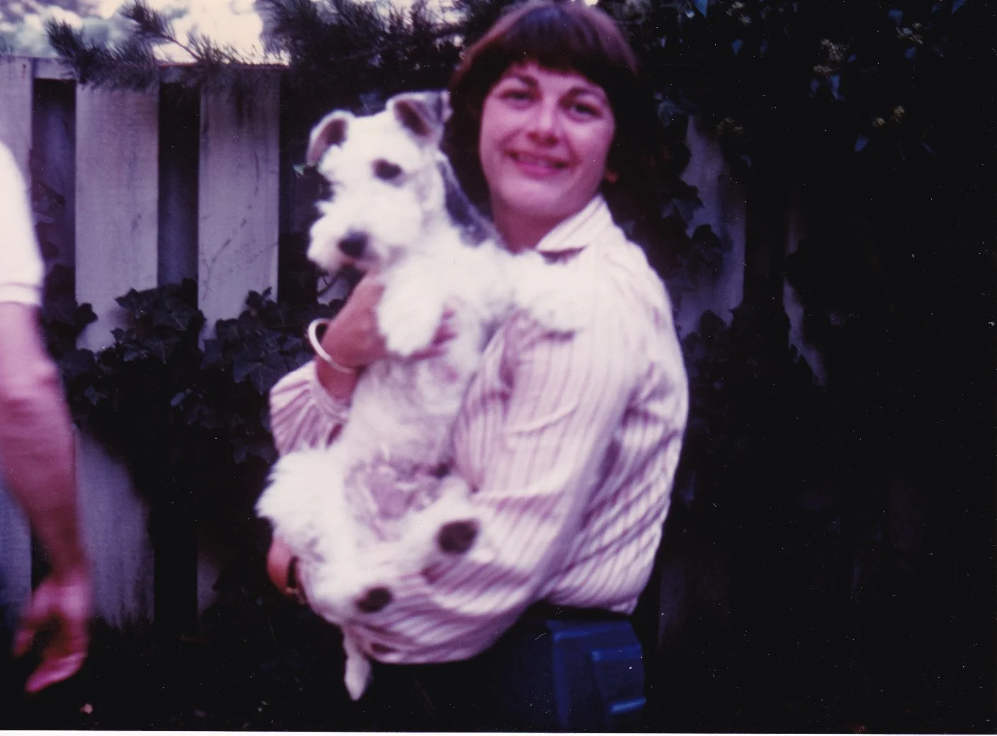 Cheryl Holding Dog.jpeg