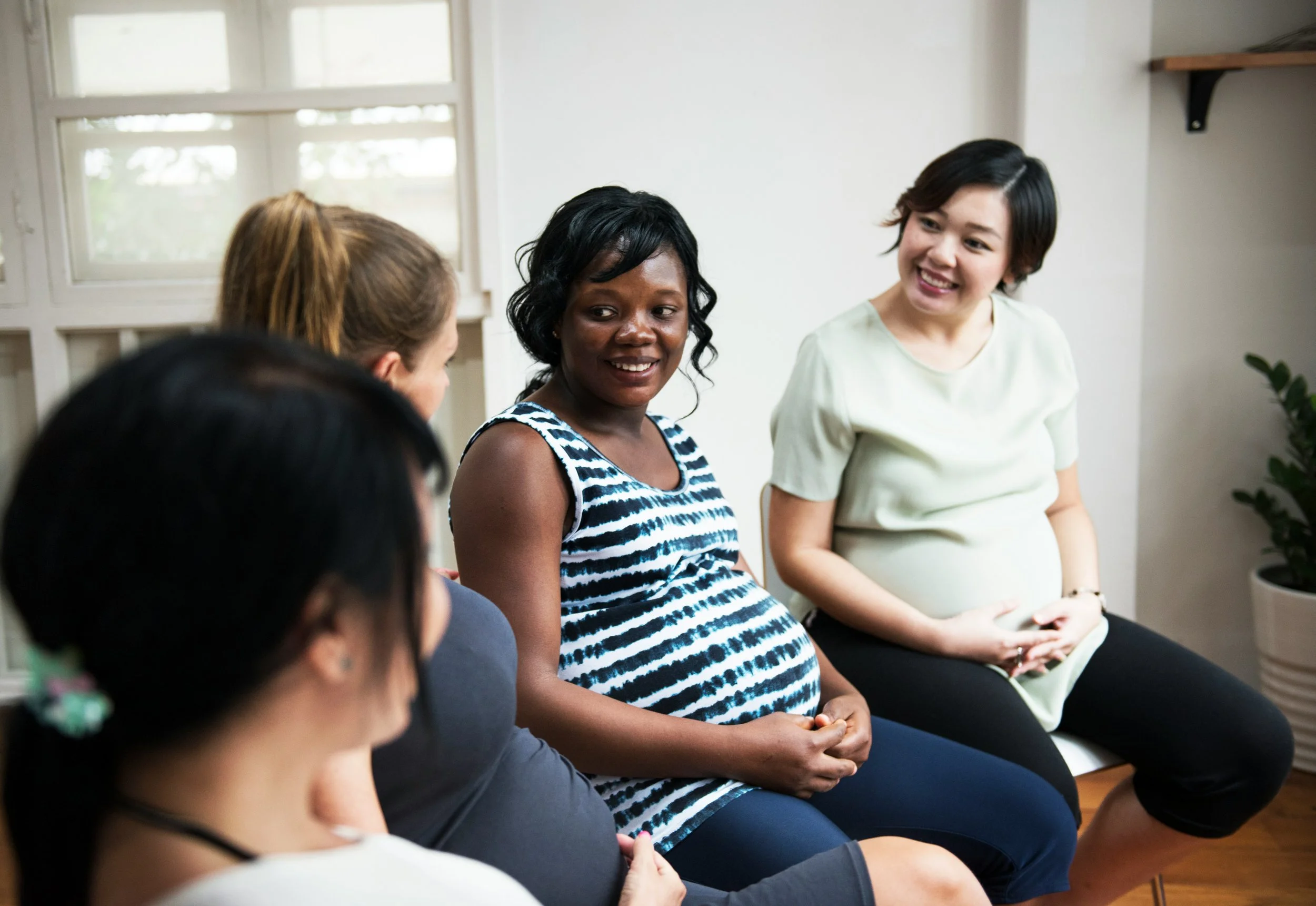 Pregnant women in a childbirth education class McKinney, TX.