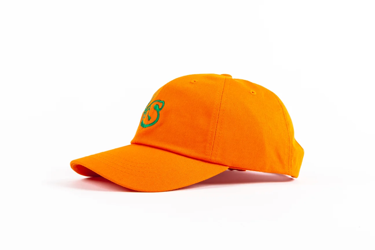 SMOKERSCLUBHAT-ORANGE-ANGLE.jpg