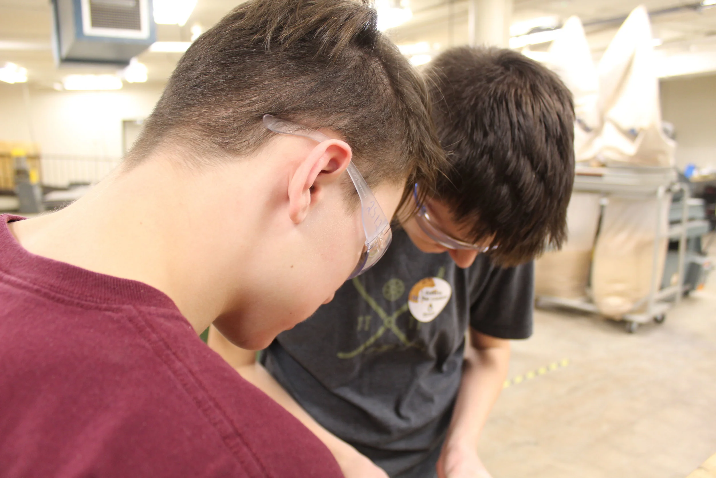 Elliot and Graham of the Electronics Department building parts of the robot