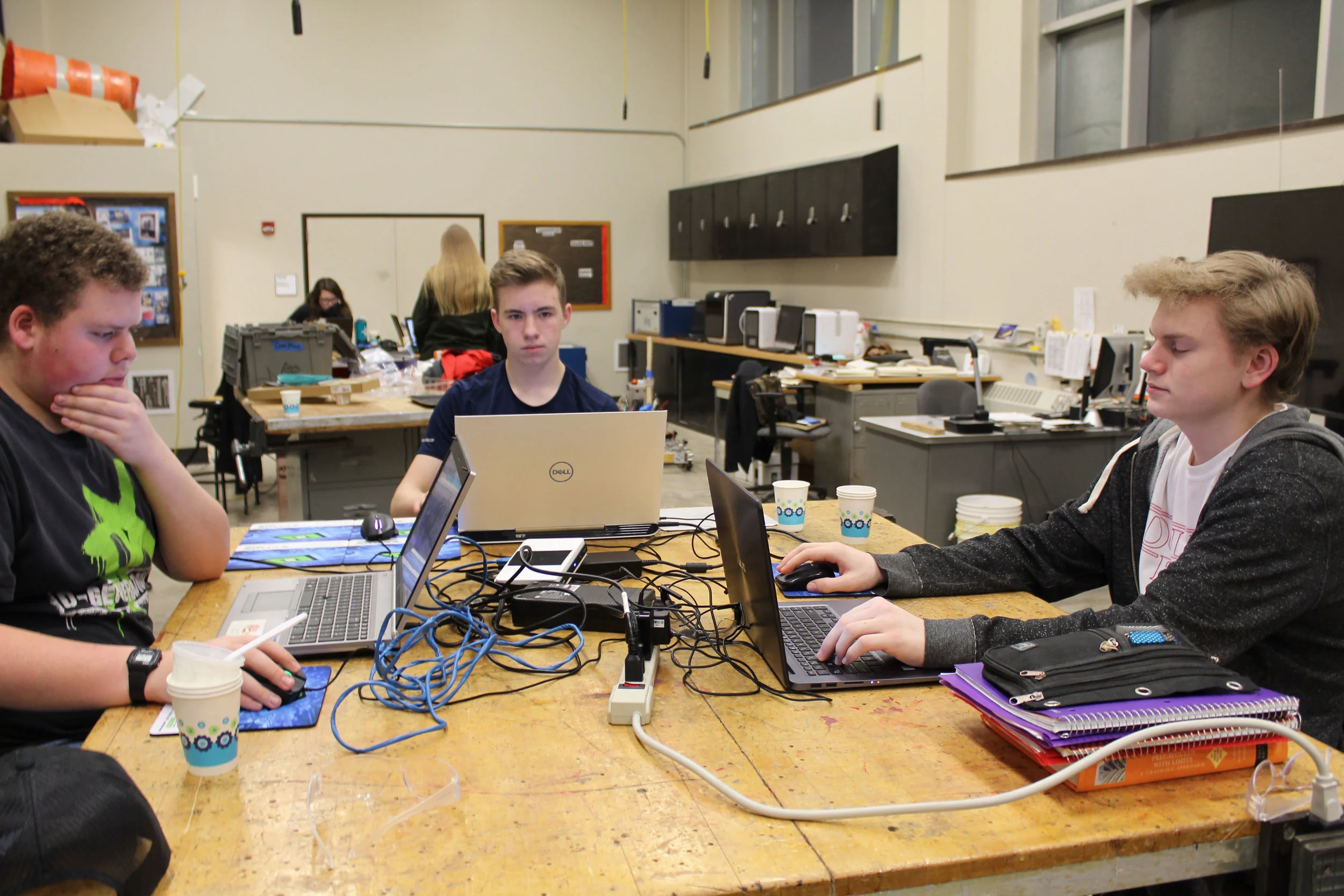 CAD Department, Jacob, Sean, and Anders designing parts for the bot.