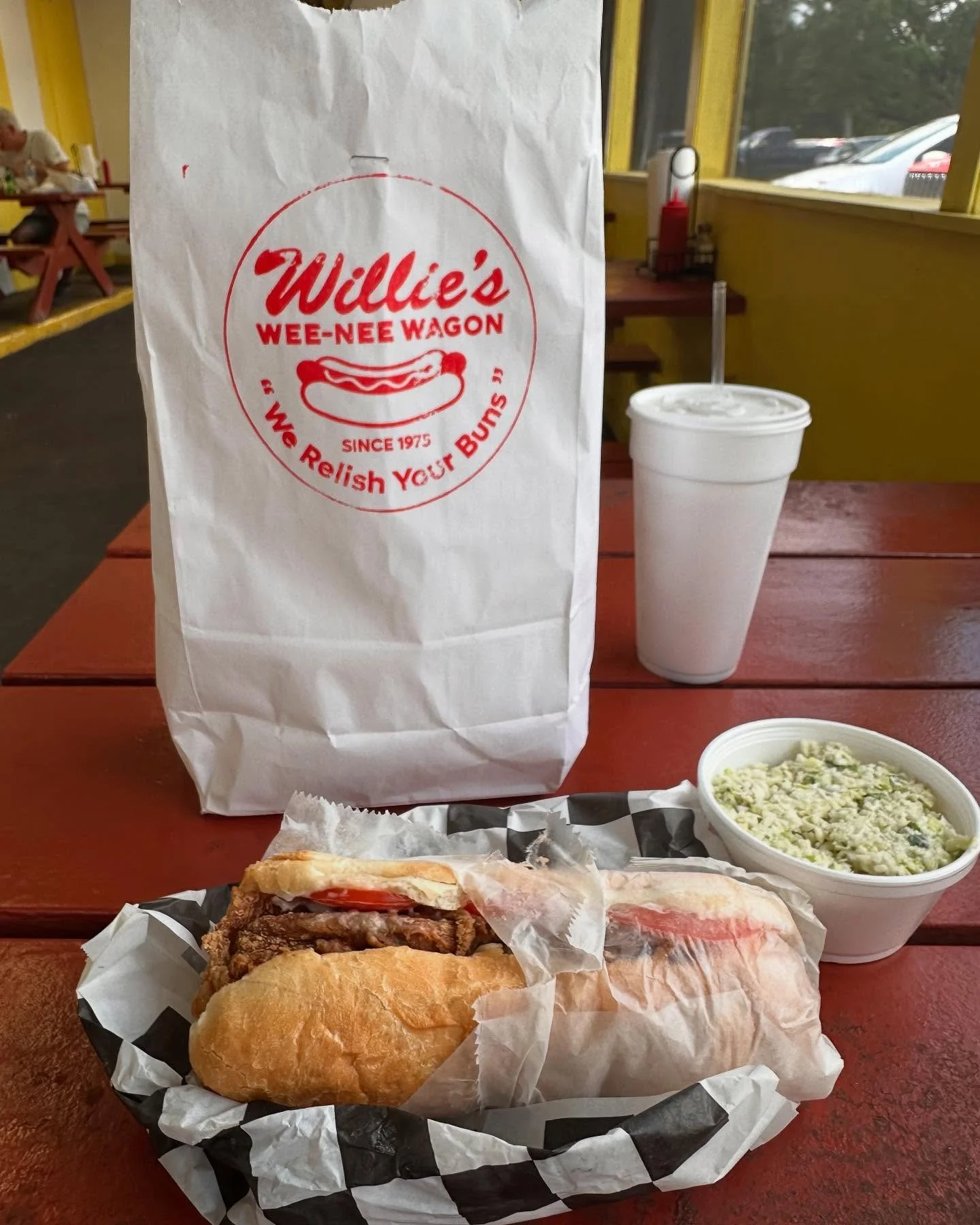 Willie&rsquo;s Wee-NeeWagon, Brunswick, Georgia, 50 years in business. This is a fried pork chop sandwich, the meat sliced thin, salty and crunchy, piled into a po boy-esque soft bun. Pickles pop. Every meal comes with sweet tea and free refills and 