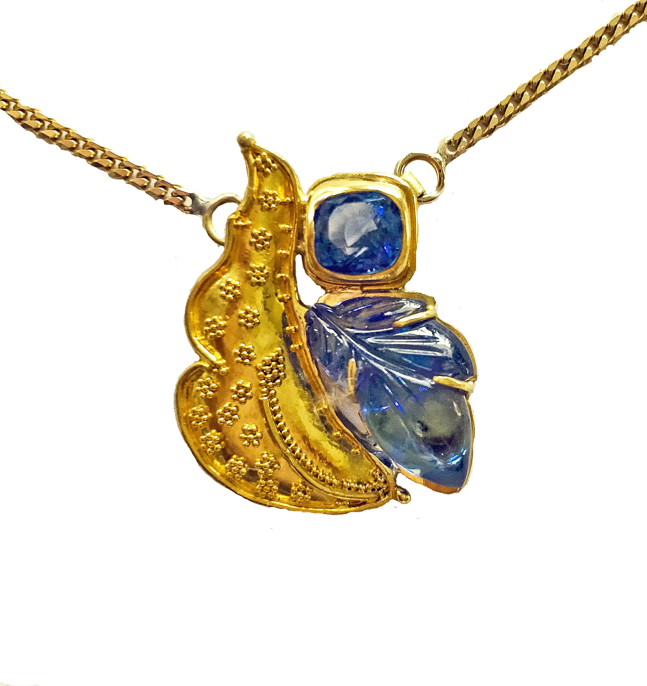 22k gold with tanzanite and sapphire