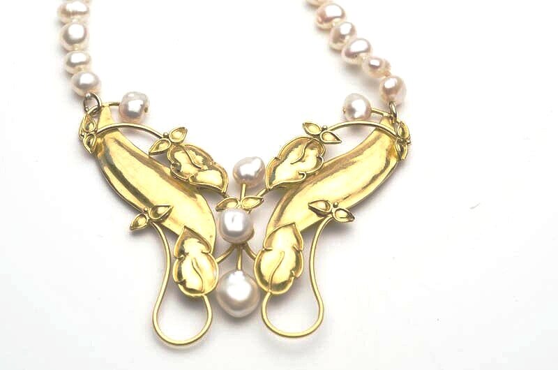 22k gold with gold overlay and fresh water pearls.