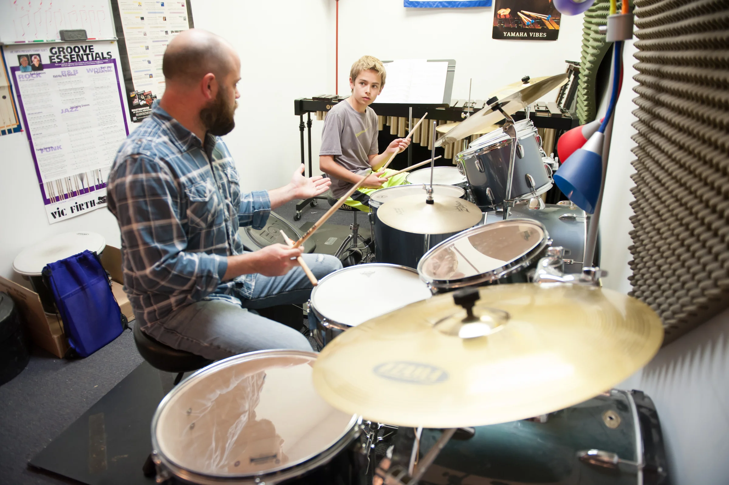 Brandon teaching drums.jpg