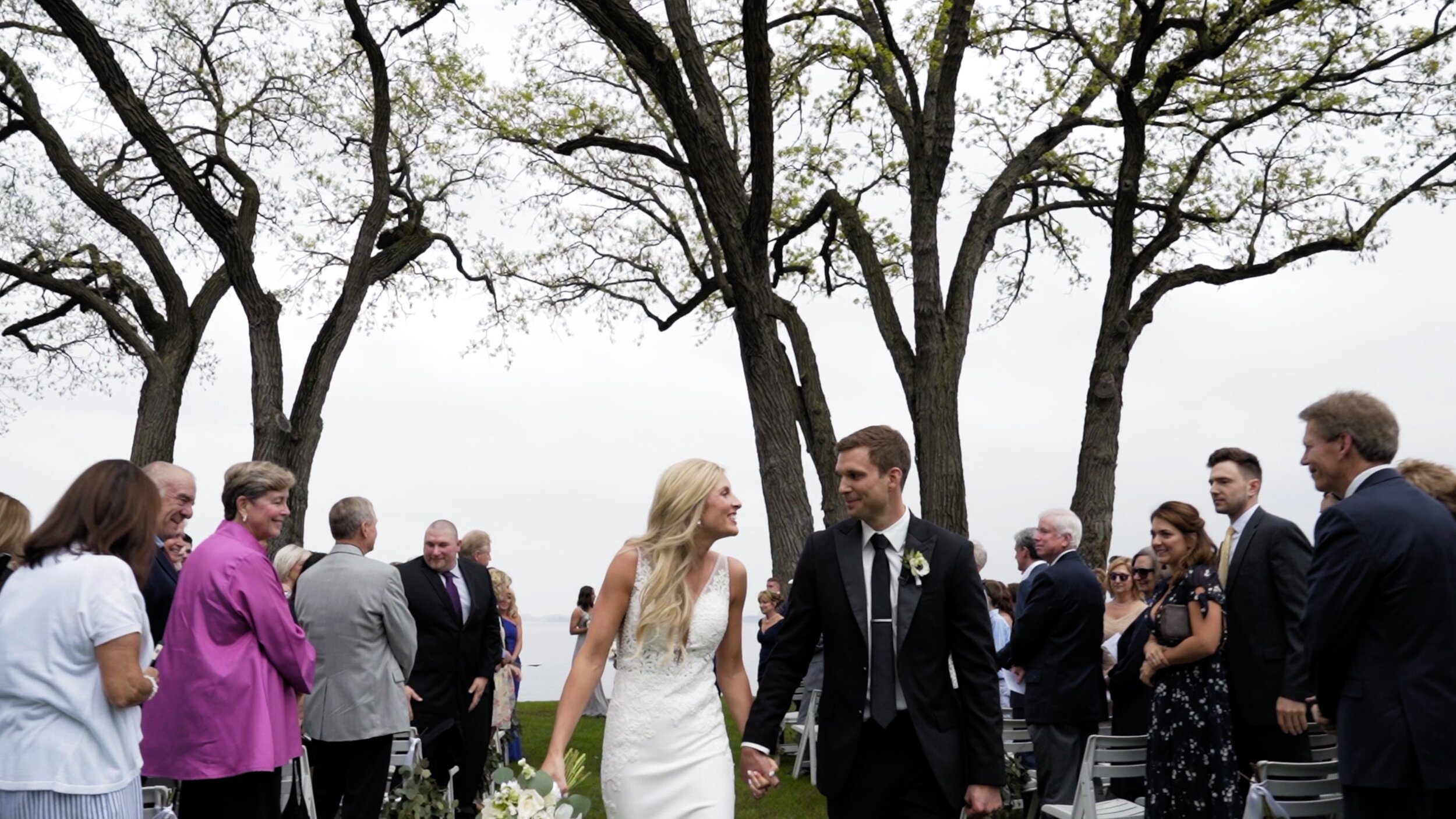 Bride and Groom exiting their outdoor ceremony at Bishops Bay Country Club Wedding venue