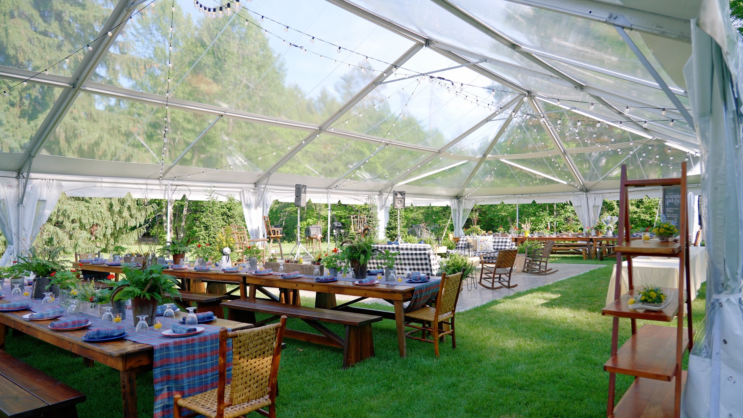outdoor rehearsal dinner venue under a glass tent