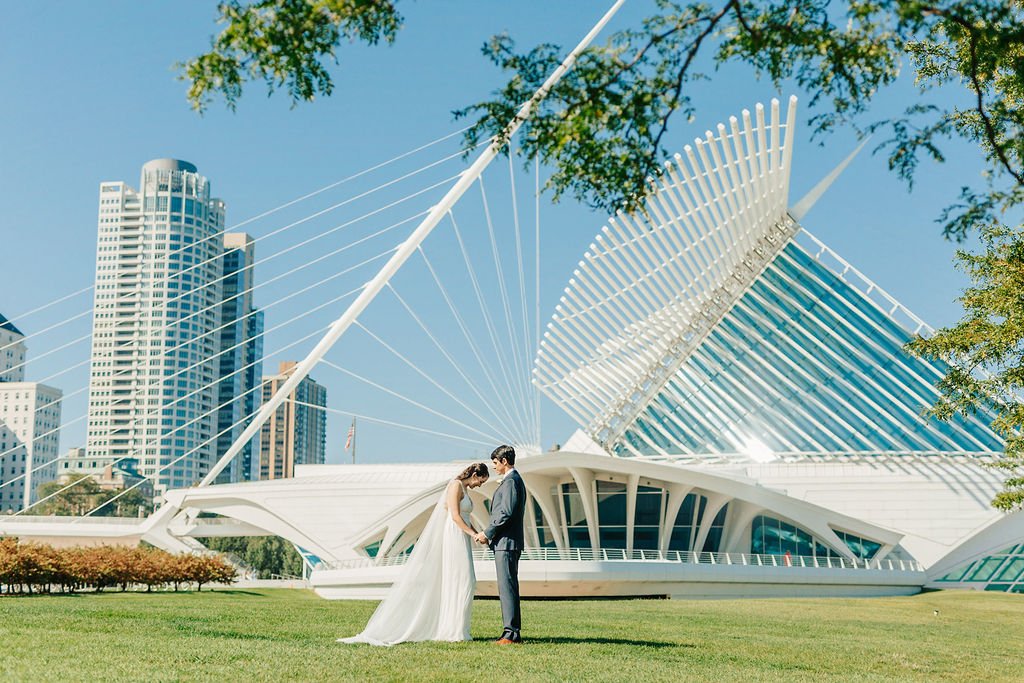 Bride and Groom outside of the Milwaukee art museum wedding Venue