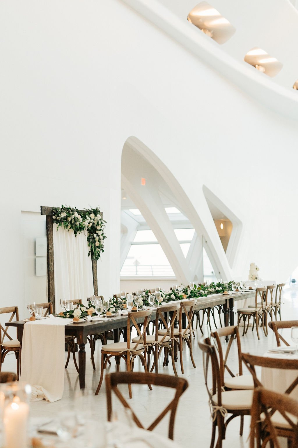 Head table for wedding reception at the Milwaukee art museum