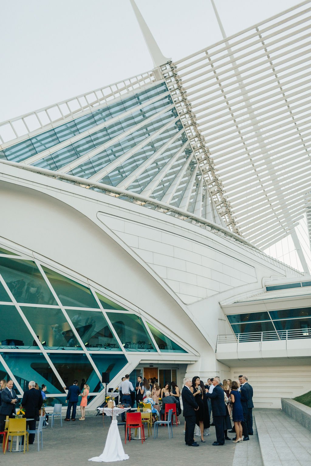 Wedding guests on the outdoor patio at the Milwaukee art museum